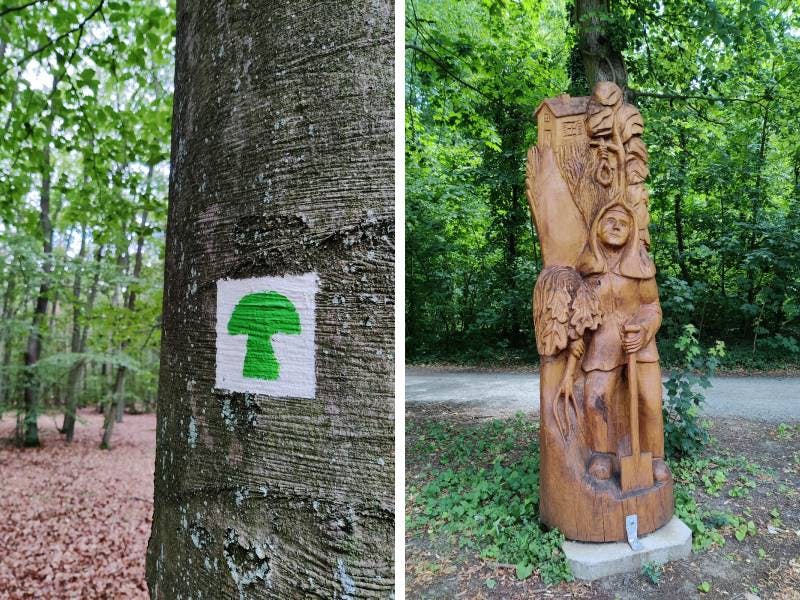 Trail markings and wooden statues 